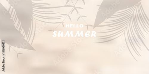 summer background of beach sand with shadows from palm leaves, top view