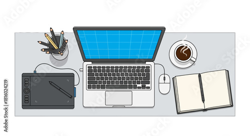 Creative workspace showcasing digital tools and traditional methods for design and writing