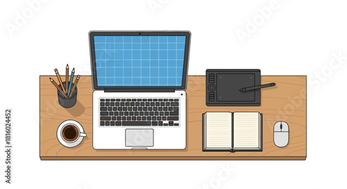 Overhead view of creative workspace with laptop, graphics tablet, and coffee cup
