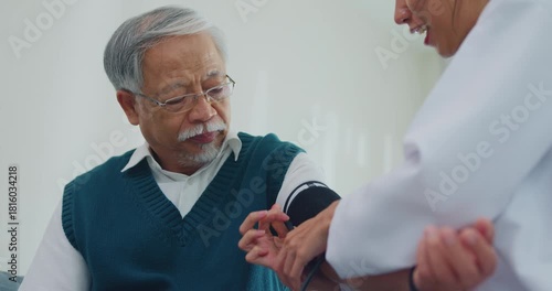 Young Asia female doctor with old man patient using blood pressure consultation or cardiology wellness or hypertension, checkup or healthcare on sofa in health clinic office. Medical worker for care.