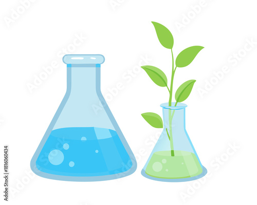 A glass science laboratory flask containing a green chemical liquid and a leaf is used for research and analysis