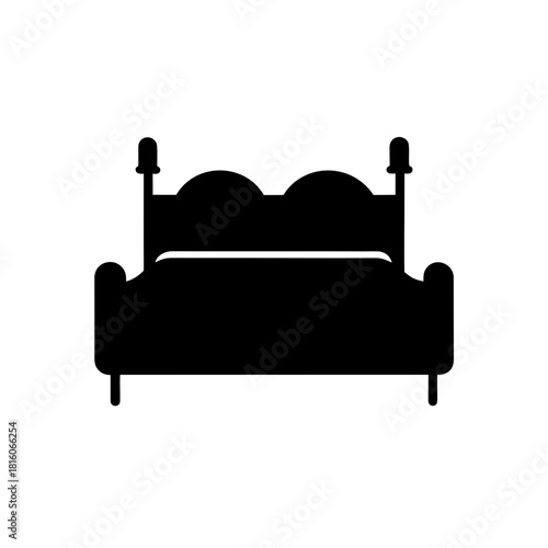 Vector silhouette of a bed with headboard