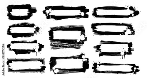 Grungy ink stencil brush strokes and paint splashes in a rectangular banner composition for text and callouts with dirty drops and blots