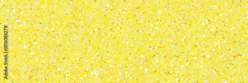 Light glitter background, texture in elegant warm tone for your holiday mood. Panoramic photo.