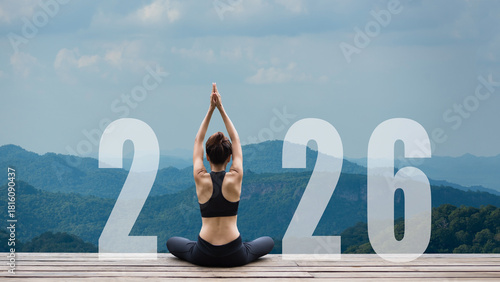 Happy new year start up 2026.  Yoga women lifestyle exercise and pose for healthy life. people balance body vital zen and meditation for workout on mountain morning nature background for success 2026