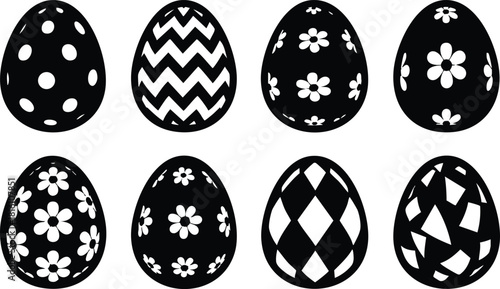Decorative black and white Easter eggs with various patterns including polka dots, zigzag, and flowers for festive celebrations 