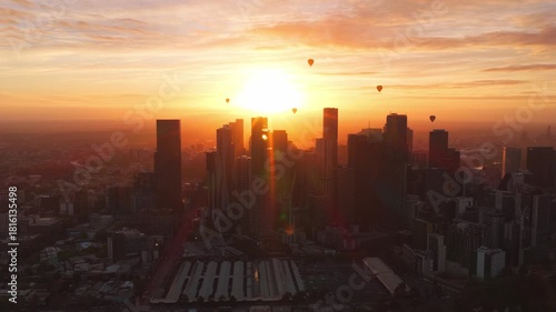 Multiple Hot Air Balloons Over Melbourne City During Sunrise