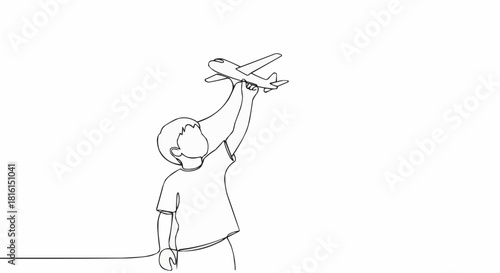 Child joyfully plays with toy airplane, dreaming of flight adventures.