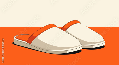 Cozy white and orange house slippers resting on an orange surface