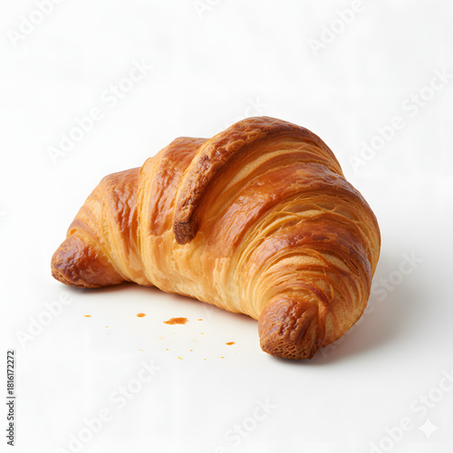 Golden Croissant: A close-up shot of a perfectly baked croissant, with its flaky layers and golden-brown exterior. The buttery pastry is a classic breakfast treat.