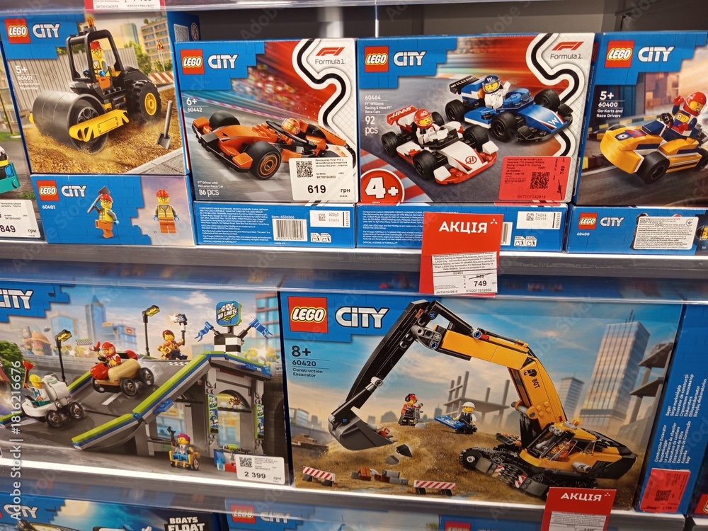 Obraz premium Zvyagel, Ukraine - November 20, 2025: LEGO City building sets displayed on store shelf, featuring various vehicles and construction themes, perfect for imaginative play and creativity