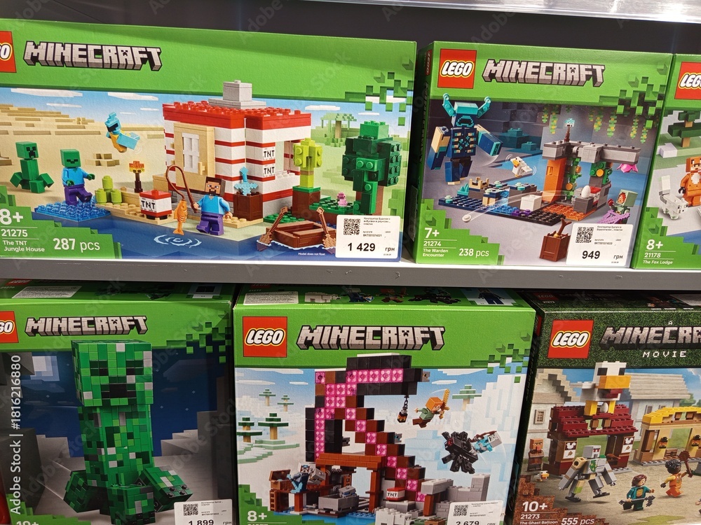 Obraz premium Zvyagel, Ukraine - November 20, 2025: LEGO Minecraft building sets displayed on store shelf, featuring various themes and characters, ideal for creative play and imaginative storytelling