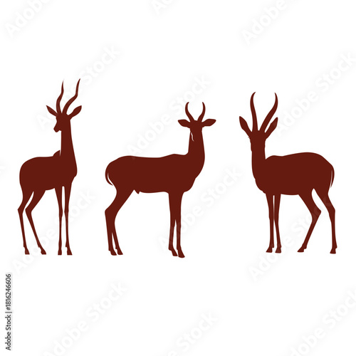 Three brown antelope silhouettes stand gracefully against an isolated on, showcasing their unique horn shapes and elegant forms