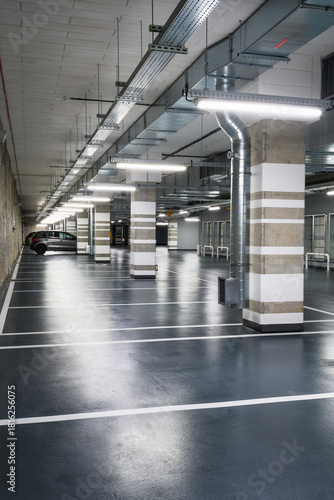Close-up of industrial electrical installations and cable trays. Intricate network of power cables and wires for industrial or commercial infrastructure.