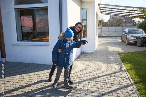 Wallpaper Mural Mother and son enjoy a sunny day outdoors Torontodigital.ca