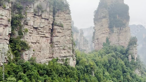 View of the mountains of Zhangjiajie National Park in Hunan Province, shrouded in mist, China