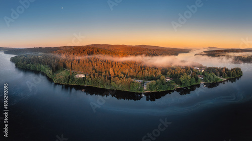 Frymburk on the shore of the Lipno dam at sunset from above