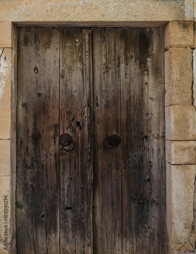 old entrance door seen from the outside of the building