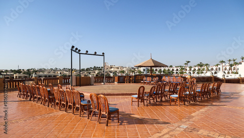 open stage for performers with rows of chairs at a hotel in Egypt.