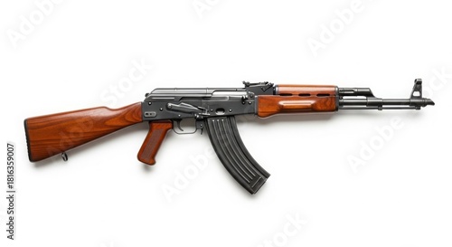 Classic ak-47 assault rifle with wooden stock and curved magazine, white backdrop