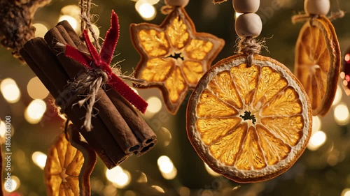 Christmas Ornaments Hanging With Cinnamon Sticks, Star and Dried Orange Slices