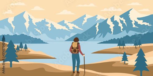 Hiker enjoying the mountain view by the lake on a sunny day