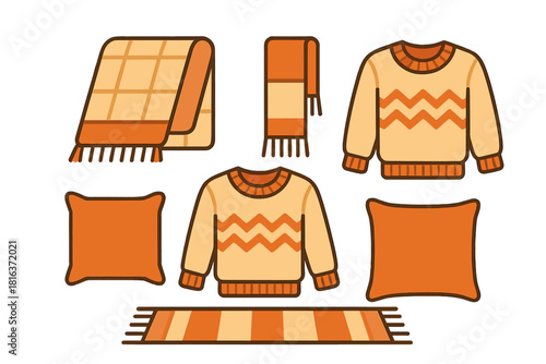 Cozy autumn and winter essentials set featuring sweaters blanket scarf pillows and rug