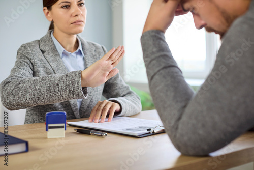 Foto Job interview rejection during business documents and employees resume review on meeting in office