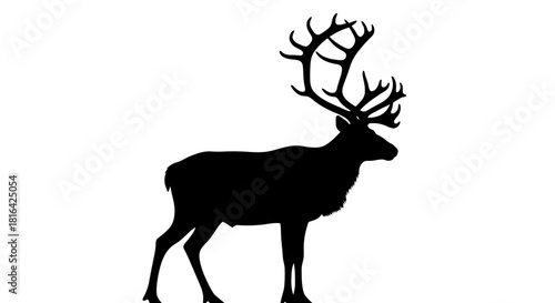 Majestic black silhouette of a reindeer with antlers