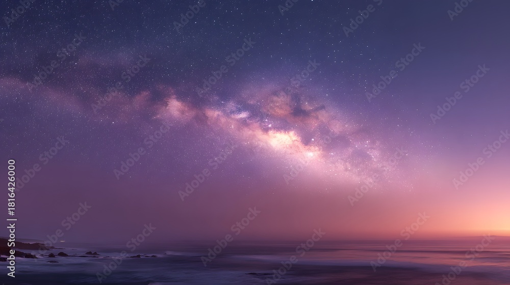 Fototapeta premium Vibrant Milky Way Galaxy Over a Calm Ocean at Twilight.