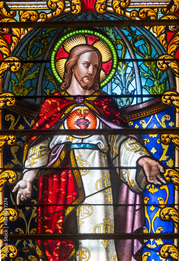 Fototapeta premium Colorful stained glass (19th century) of Sacred Heart of Jesus Christ.