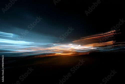 Dynamic light trails in night sky with vibrant streaks