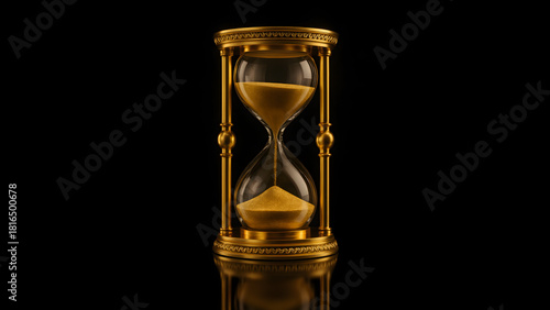 Isolated Golden Hourglass with Flowing Sand for Time