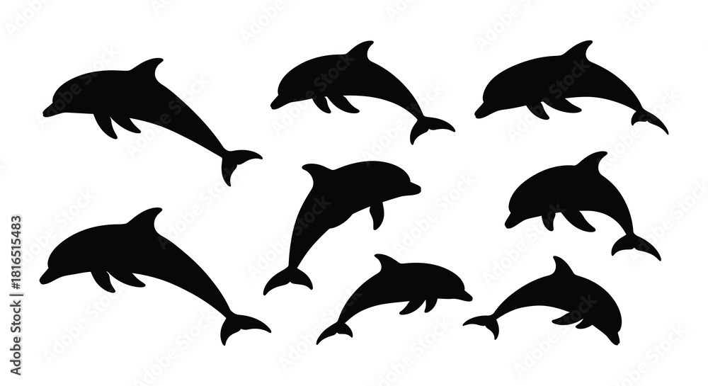 Fototapeta premium Silhouette depictions of several playful dolphins leaping and swimming in water