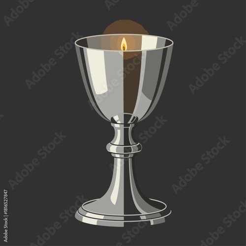 A silver chalice with a lit candle inside, casting a warm glow against a dark background.
