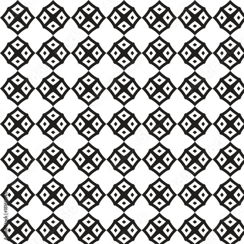 Intricate black and white geometric pattern featuring repeating diamond shapes with detailed inner motifs