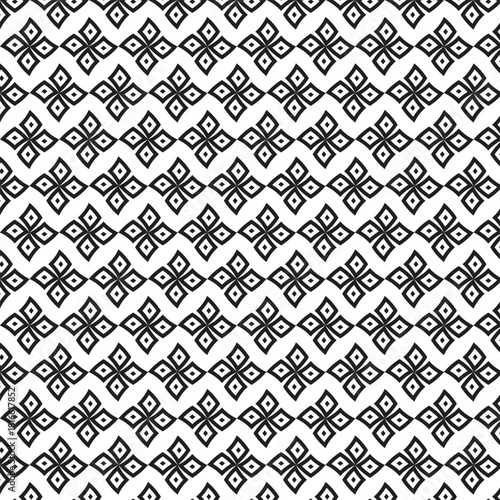 Intricate black and white geometric floral pattern repeating seamlessly across the surface