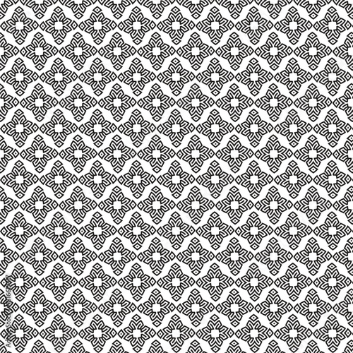 Intricate black and white geometric pattern with repeating diamond shapes and swirling floral elements creating a textured visual effect