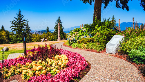 Fototapeta Naklejka Na Ścianę i Meble -  Garden at Kushiro  Park, Burnaby Mountain, BC on a sunny summer day.