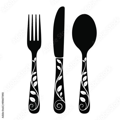 Isolated silver dining cutlery set including fork spoon and knife on white background