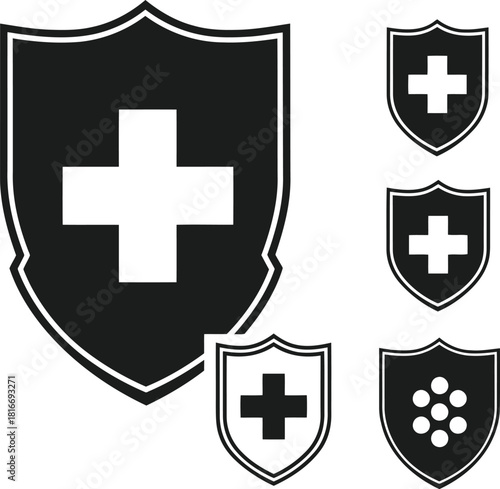 A collection of black shield icons with a white cross for security and protection concepts