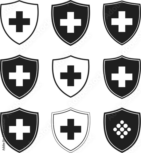 Set of nine shield icons with medical cross and dots