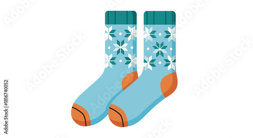 Cozy light blue winter socks with snowflake patterns and orange heels, perfect for cold weather comfort and warmth