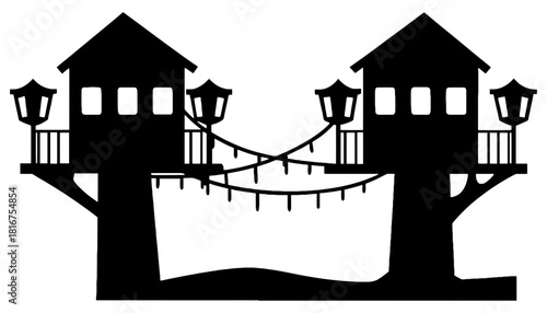 Silhouette of two treehouses connected by a bridge with string lights