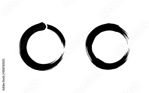 Two hand-drawn black enso circles, symbolizing enlightenment and the universe.