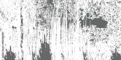 Grayscale abstract texture featuring dense vertical white brush strokes against a dark gray backdrop. The white paint shows varying densities and textures creating a distressed grunge effect.