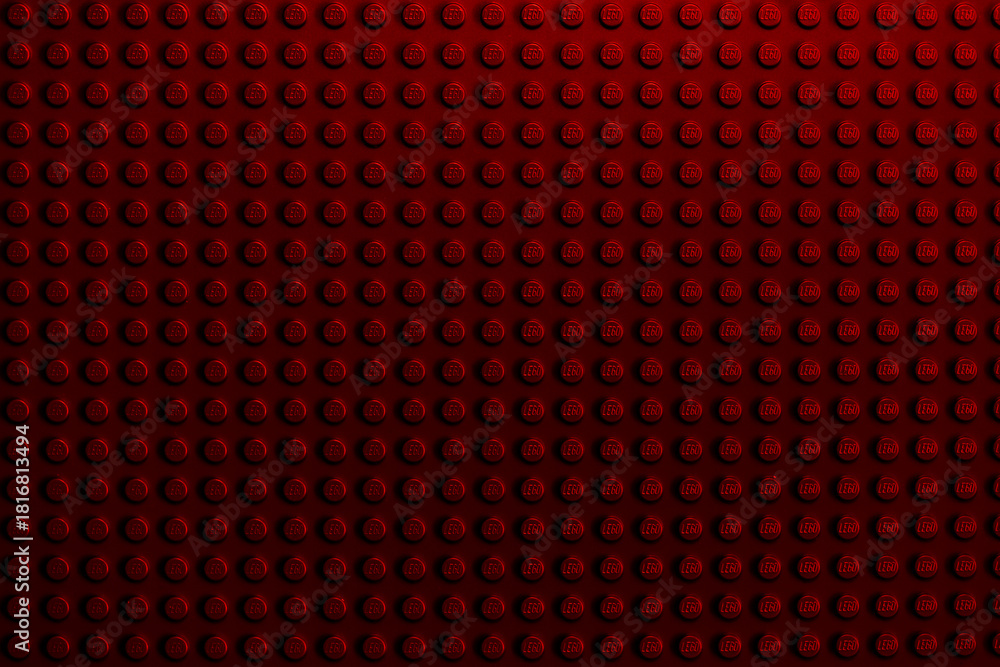 Fototapeta premium Red background of the LEGO Classic baseplate