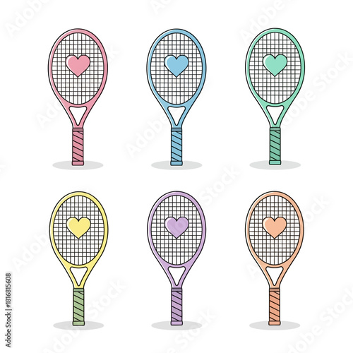 Colorful tennis rackets with hearts, a playful sports equipment display for kids or young adults