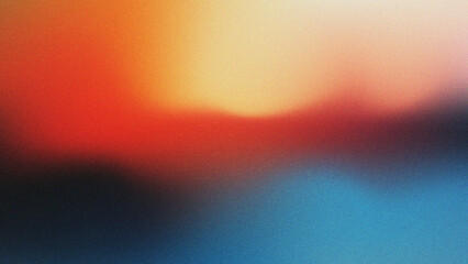Vibrant abstract gradient with fiery reds warm oranges and cool blues in a textured pattern