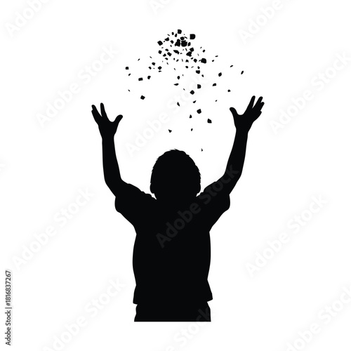Child reaching up to falling confetti silhouette
